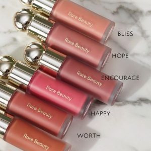 rare beauty positive light luminizing lip gloss